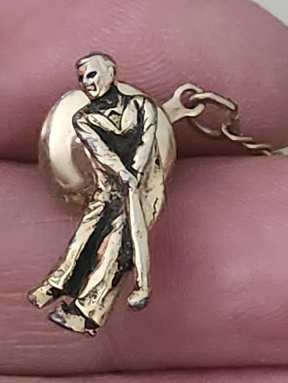 Gold-Tone Golfer Hitting Ball Figure Lapel Pin